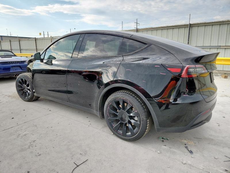 Снимка 2 от търг – 2023 TESLA MODEL Y с VIN 7SAYGAEE9PF708142