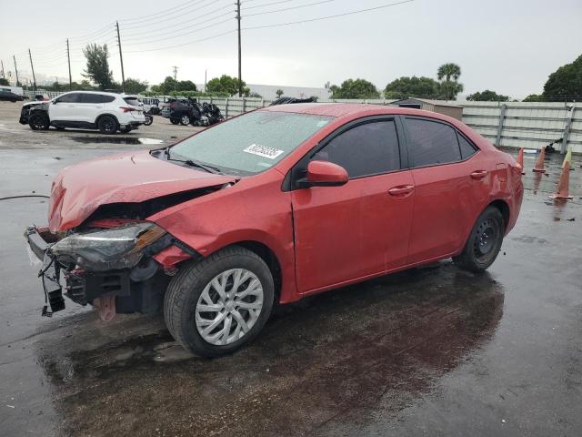 TOYOTA COROLLA L 2018 with VIN 5YFBURHE4JP797975 - Photo from auction