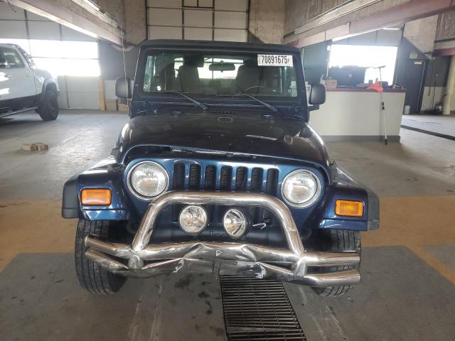 Photo 5 from auction – 2003 JEEP WRANGLER COMMANDO with VIN 1J4FA39S13P324500