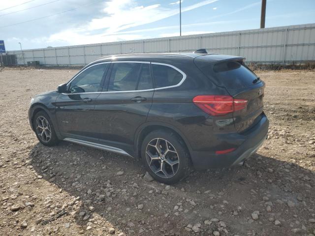 Photo 2 from auction – 2016 BMW X1 XDRIVE2 with VIN WBXHT3C35G5E52188