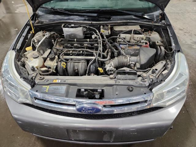 Photo 11 from auction – 2009 FORD FOCUS with VIN 1FAHP37N59W190654