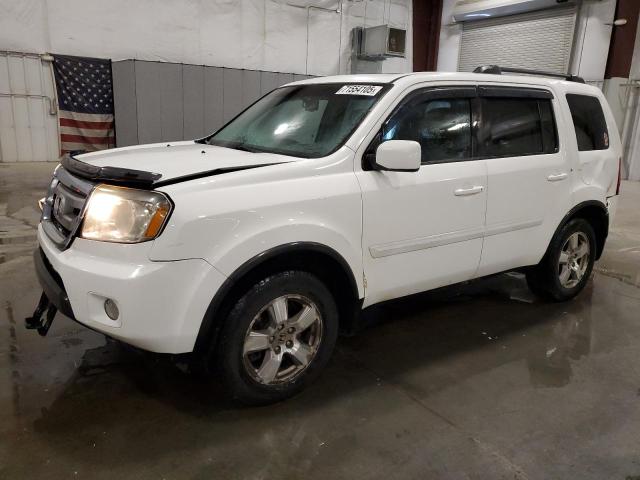 HONDA PILOT EXL 2011 with VIN 5FNYF4H52BB048631 - Photo from auction