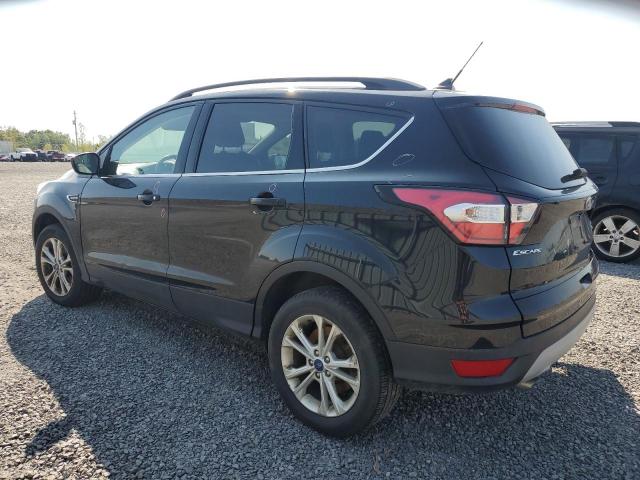 Photo 2 from auction – 2018 FORD ESCAPE SEL with VIN 1FMCU9H96JUC92798