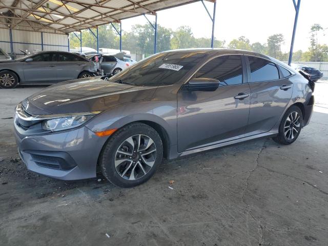 Photo 1 from auction – 2018 HONDA CIVIC LX with VIN 19XFC2E55JE026913