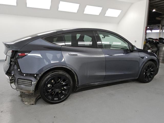 Photo 3 from auction – 2022 TESLA MODEL Y with VIN 7SAYGDEE2NF495436