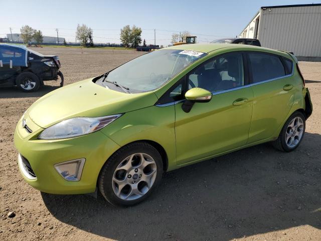 FORD FIESTA SES 2012 with VIN 3FADP4FJ0CM169317 - Photo from auction