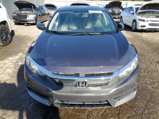 Photo 5 from auction – 2016 HONDA CIVIC LX with VIN 19XFC2F51GE069331