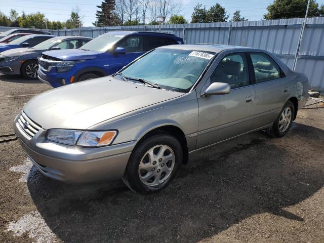 TOYOTA CAMRY CE 1998 with VIN JT2BF22K1W0091007 - Photo from auction