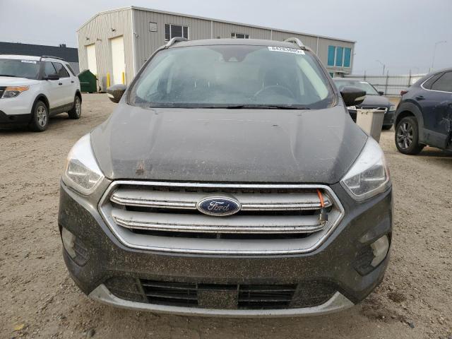 Photo 5 from auction – 2019 FORD ESCAPE TIT with VIN 1FMCU9J98KUC14079