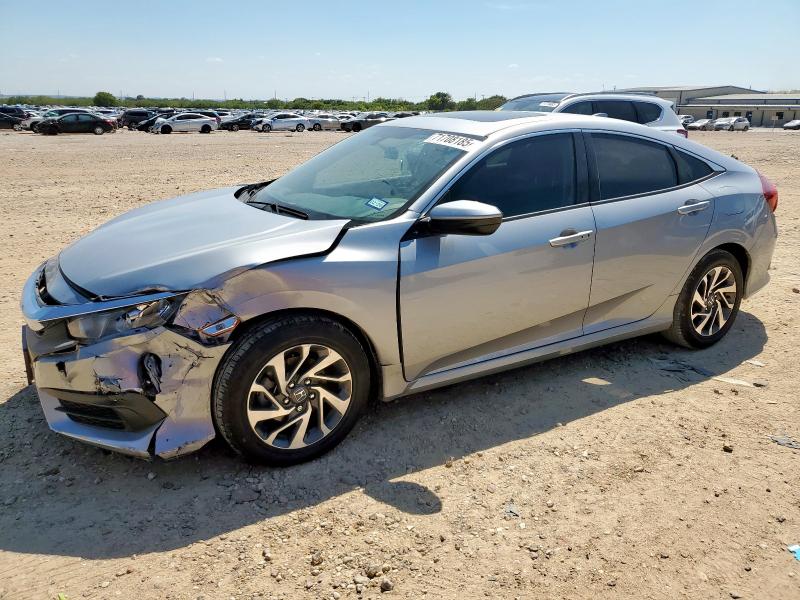HONDA CIVIC EX 2017 with VIN 2HGFC2F74HH560212 - Photo from auction
