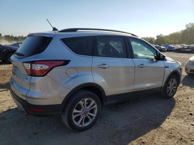 Photo 3 from auction – 2018 FORD ESCAPE SE with VIN 1FMCU9GD6JUA59557