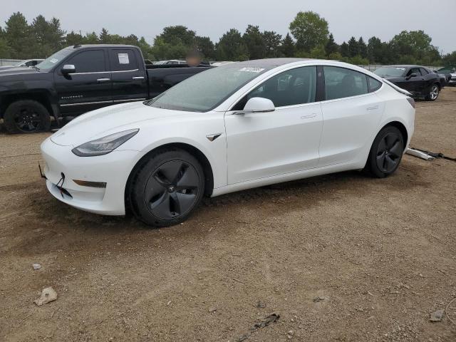 TESLA MODEL 3 2018 with VIN 5YJ3E1EB9JF092291 - Photo from auction