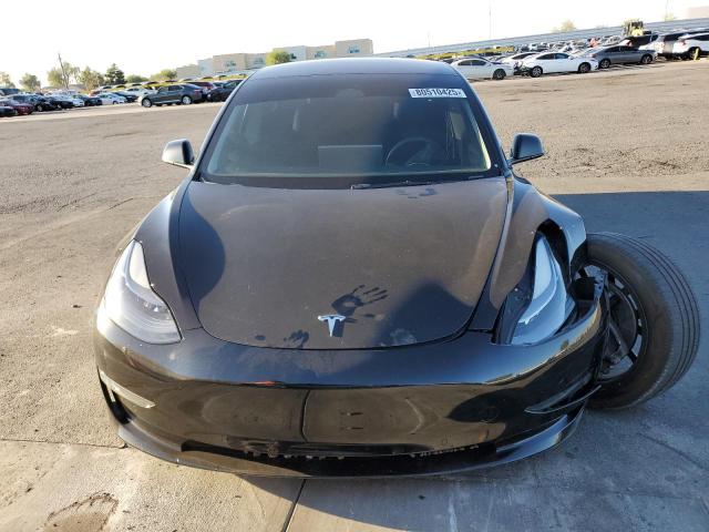 Photo 5 from auction – 2022 TESLA MODEL 3 with VIN 5YJ3E1EA6NF357178