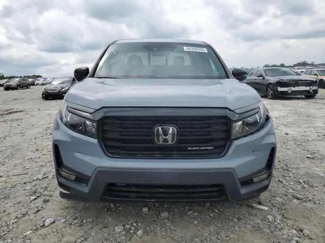 Photo 5 from auction – 2022 HONDA RIDGELINE BLACK EDITION with VIN 5FPYK3F85NB020367