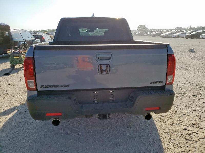 Photo 6 from auction – 2023 HONDA RIDGELINE with VIN 5FPYK3F18PB033085