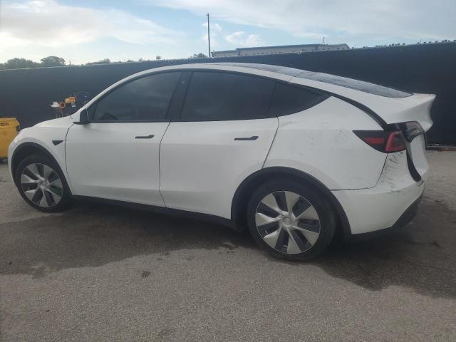 Photo 2 from auction – 2021 TESL MODEL Y with VIN 5YJYGDED3MF123400