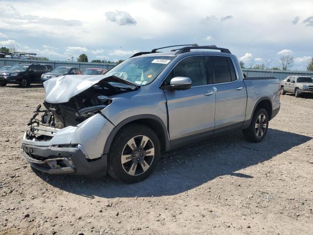 HONDA RIDGELINE RTL 2017 with VIN 5FPYK3F79HB019914 - Photo from auction