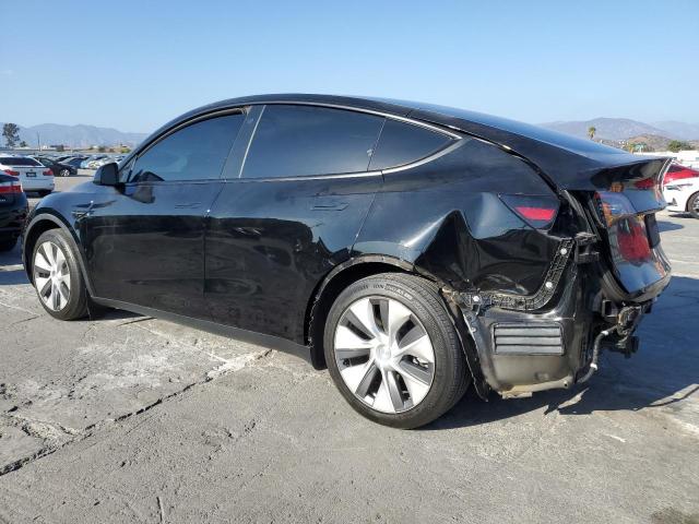 Photo 2 from auction – 2022 TESLA MODEL Y with VIN 7SAYGAEE0NF493974