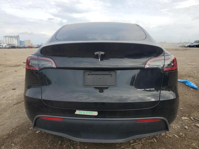 Photo 6 from auction – 2023 TESLA MODEL Y with VIN 7SAYGAEE7PF908534