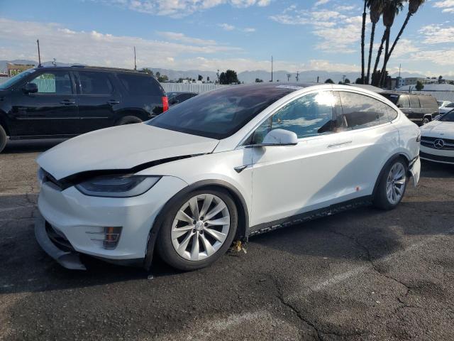 TESLA MODEL X 2018 with VIN 5YJXCDE23JF141493 - Photo from auction