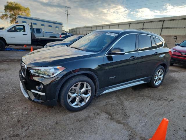 BMW X1 XDRIVE2 2016 with VIN WBXHT3C32GP886943 - Photo from auction