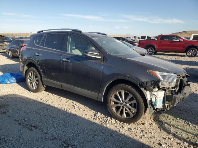 Photo 4 from auction – 2018 TOYOTA RAV4 LIMIT with VIN 2T3DFREV4JW836657