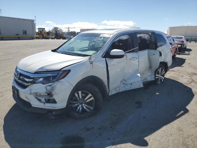 HONDA PILOT EXL 2018 with VIN 5FNYF6H50JB061789 - Photo from auction