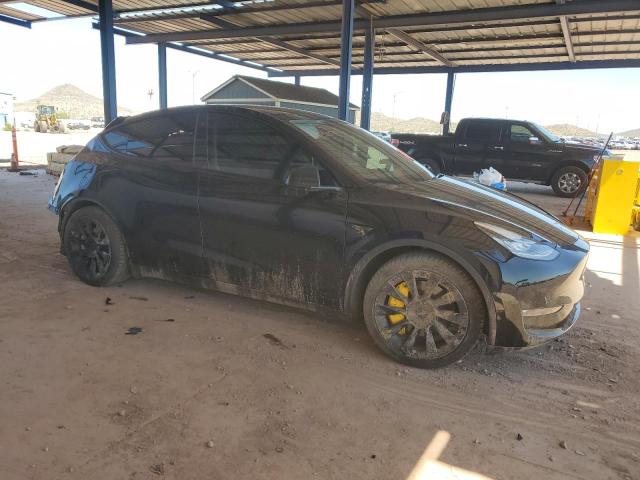 Photo 4 from auction – 2021 TESLA MODEL Y with VIN 5YJYGAEE5MF232089