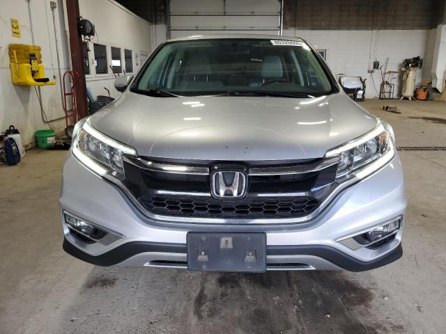 Photo 5 from auction – 2015 HONDA CR-V EX with VIN 2HKRM4H52FH658028