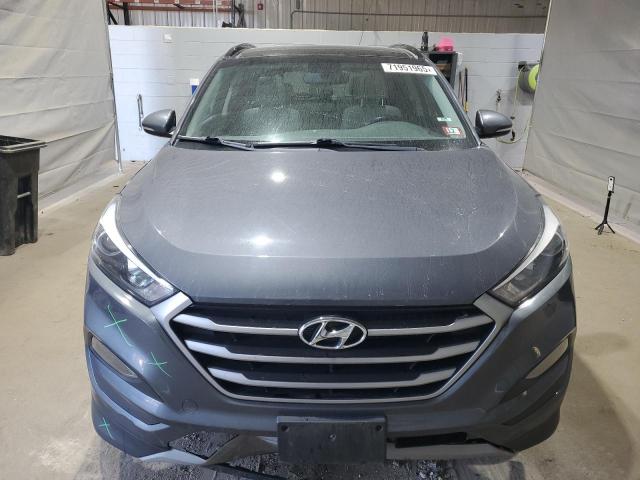 Photo 5 from auction – 2018 HYUNDAI TUCSON VALUE with VIN KM8J3CA23JU800505