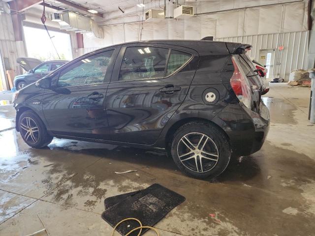 Photo 2 from auction – 2015 TOYOTA PRIUS C with VIN JTDKDTB35F1114438