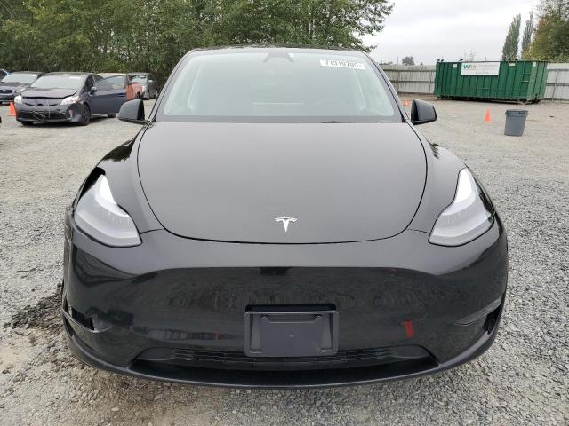 Photo 5 from auction – 2023 TESLA MODEL Y with VIN 7SAYGAEE0PF807948