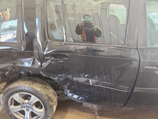 Photo 11 from auction – 2012 HONDA PILOT EXL with VIN 5FNYF4H54CB007693