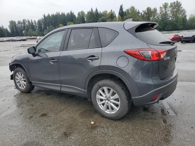 Photo 2 from auction – 2015 MAZDA CX-5 TOURING with VIN JM3KE2CY4F0479644