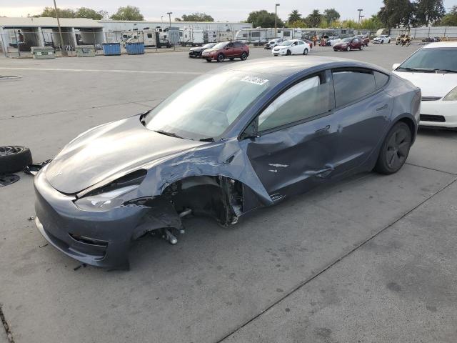 TESLA MODEL 3 2022 with VIN 5YJ3E1EAXNF336785 - Photo from auction