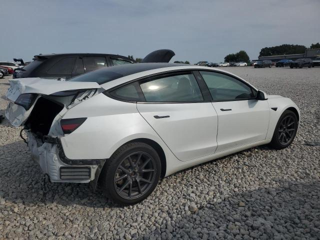 Photo 3 from auction – 2021 TESLA MODEL 3 with VIN 5YJ3E1EB9MF869637