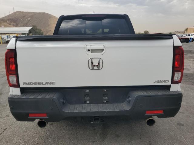 Photo 6 from auction – 2023 HONDA RIDGELINE with VIN 5FPYK3F87PB000494