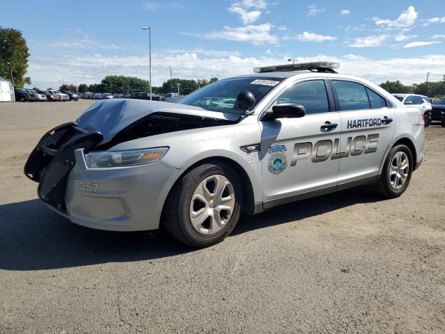 FORD TAURUS POL 2014 with VIN 1FAHP2MK0EG158087 - Photo from auction
