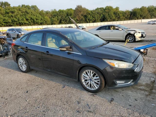 Photo 4 from auction – 2015 FORD FOCUS TITA with VIN 1FADP3J26FL368355