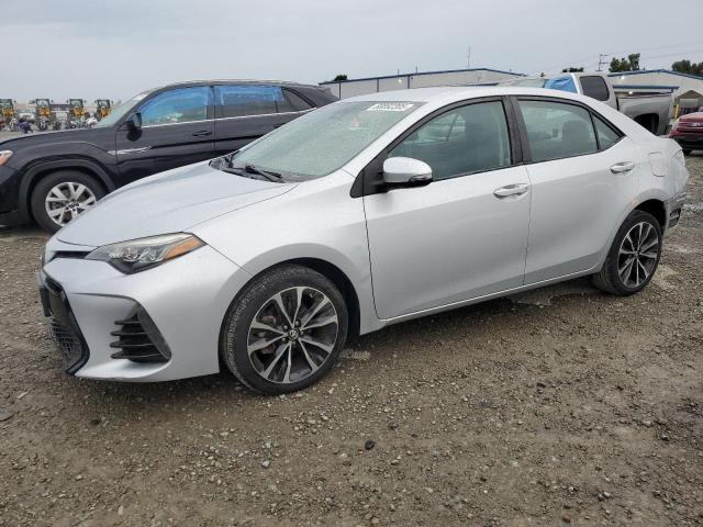 TOYOTA COROLLA L 2017 with VIN 5YFBURHEXHP687846 - Photo from auction