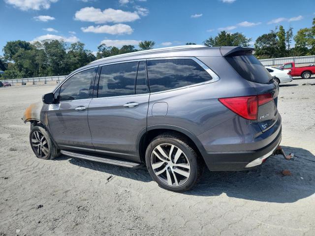 Photo 2 from auction – 2016 HONDA PILOT TOURING with VIN 5FNYF6H91GB016503