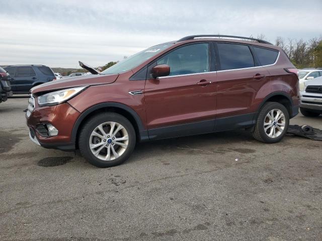 FORD ESCAPE SE 2018 with VIN 1FMCU9GD1JUB19387 - Photo from auction