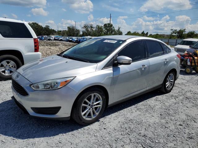 FORD FOCUS SE 2016 with VIN 1FADP3F29GL303297 - Photo from auction