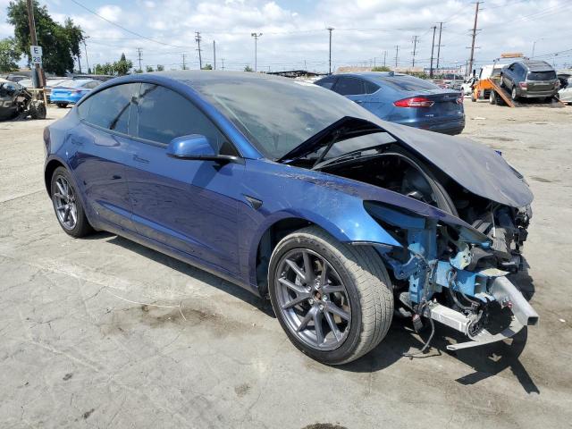 Photo 4 from auction – 2021 TESLA MODEL 3 with VIN 5YJ3E1EB9MF069338