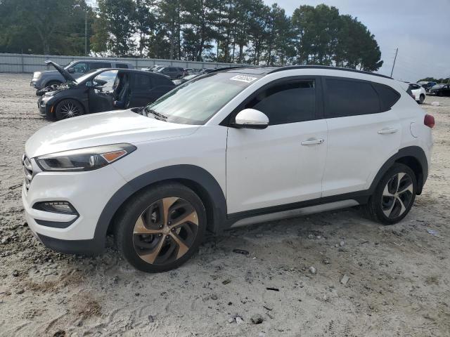 HYUNDAI TUCSON VALUE 2018 with VIN KM8J33A22JU645302 - Photo from auction
