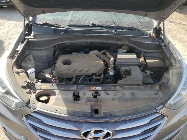 Photo 12 from auction – 2017 HYUNDAI SANTA FE S with VIN 5NMZU4LA5HH041467