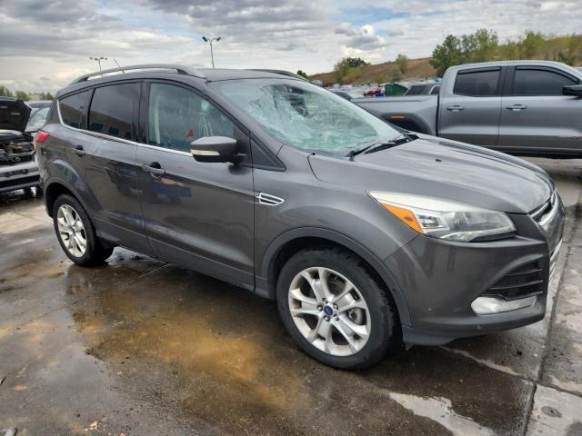Photo 4 from auction – 2016 FORD ESCAPE TIT with VIN 1FMCU9J90GUC79354