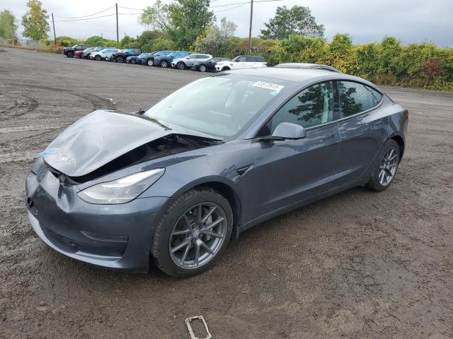 TESLA MODEL 3 2022 with VIN 5YJ3E1EAXNF326032 - Photo from auction