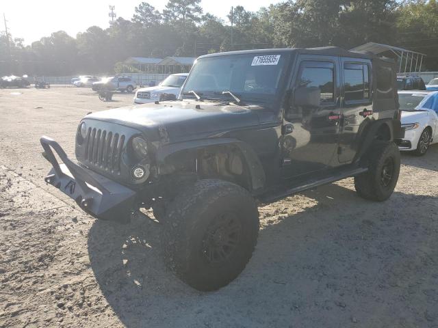 JEEP WRANGLER U 2011 with VIN 1J4BA3H1XBL506449 - Photo from auction