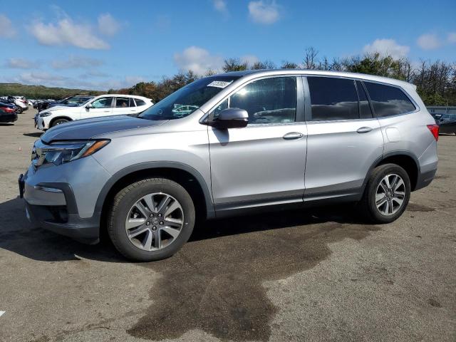 HONDA PILOT EXL 2021 with VIN 5FNYF6H54MB066238 - Photo from auction